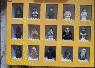 Lego minifigures in display cases