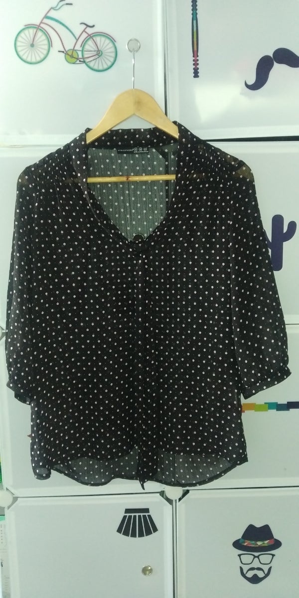 black shirt with dots