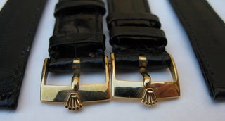 Rolex 18k gold buckle on black crocodile leather