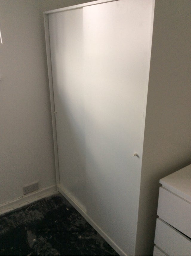 Wardrobe with sliding doors