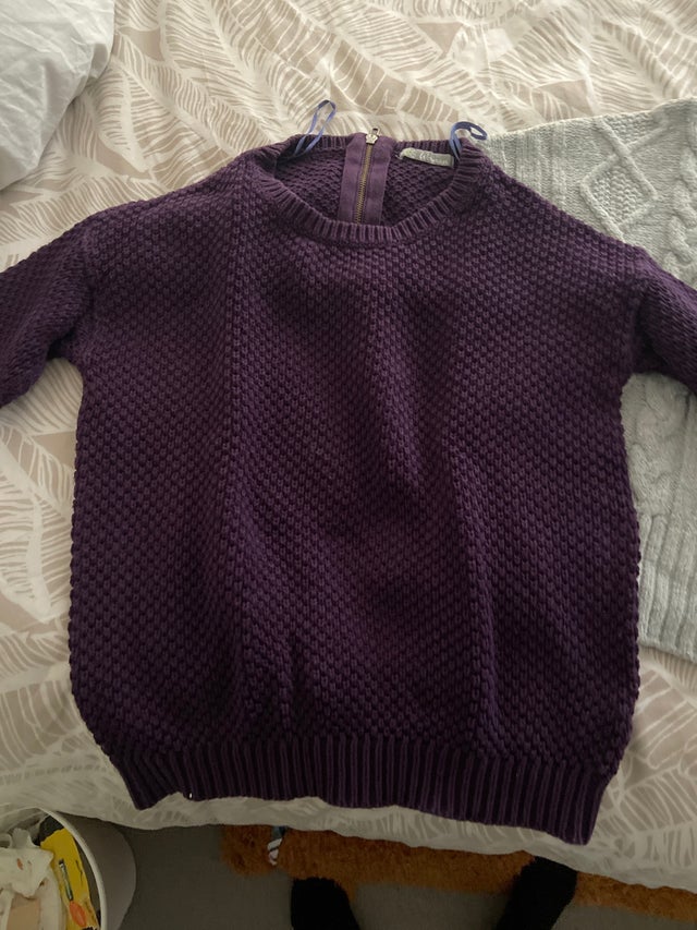 A pack of three sweaters