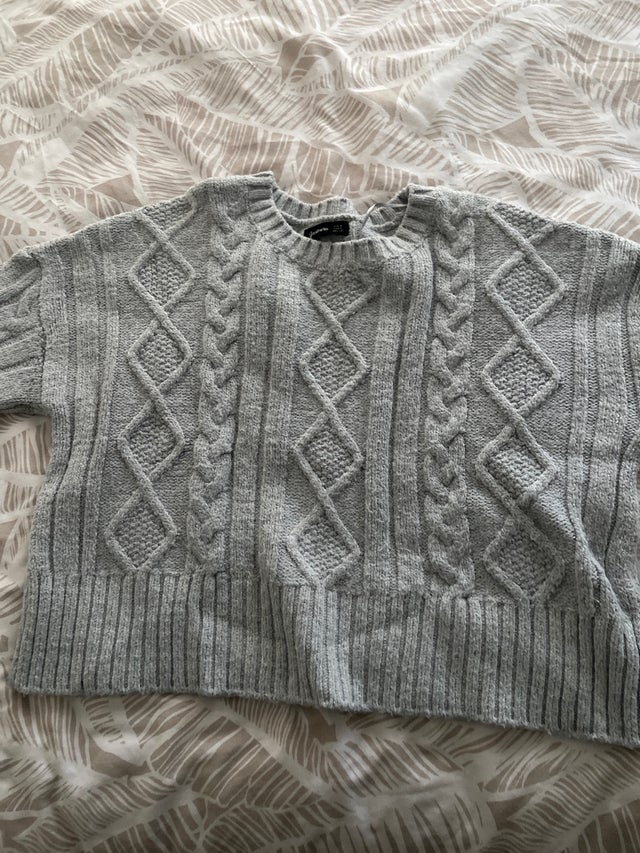 A pack of three sweaters