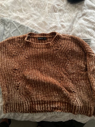A pack of three sweaters