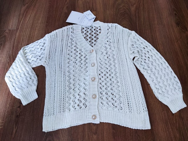 Buttoned cream knitted cardigan
