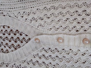 Buttoned cream knitted cardigan