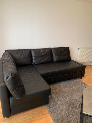 Corner sofa-bed with storage