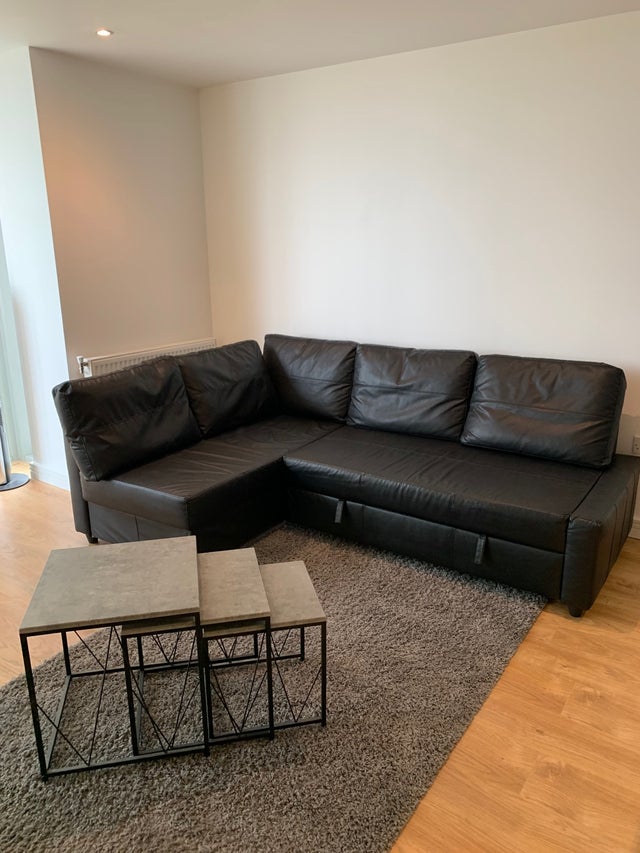 Corner sofa-bed with storage